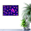 Picture of close up of succulent plant, bright blue, purple, pink and yellow, hanging on a wall