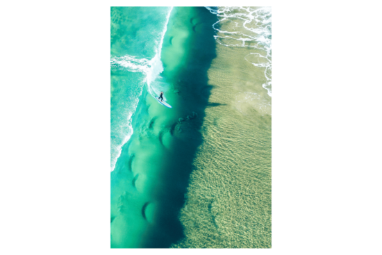 beach from above with single surfer regular print