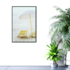 yellow beach chair, white umbrella at beach picture on wall
