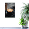black coffee cup with Le Cafe picture hanging on wall