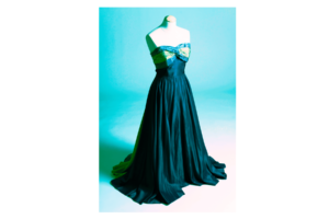 teal blue dress on mannequin with blue background wall print