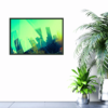 green and yellow abstract city skyline print on wall