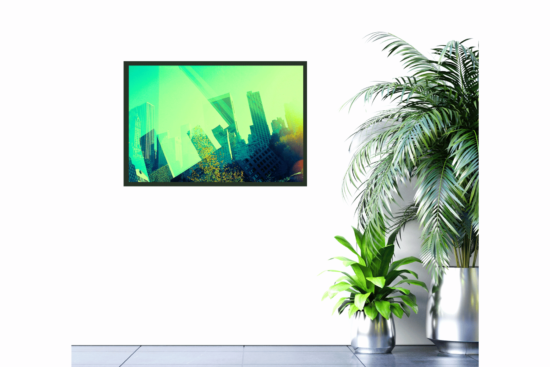green and yellow abstract city skyline print on wall
