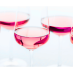 close up of various wines in glasses with white background wall print