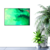 Green abstract picture, looks like ocean or clouds, hanging on wall