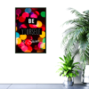 Colorful lights with Be Yourself and Shine quote picture hanging on wall