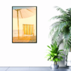 Vintage beach scene with white umbrella and striped chair picture hanging on wall
