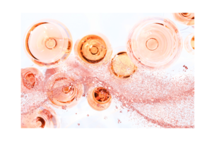 Wine glasses from above against a white background and a wave of pink glitter across the front wall print