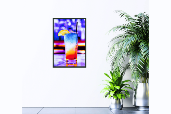 purple, orange, and white cocktail with lemon wedge print hanging on wall