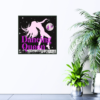Dancing queen in purple and silver print hanging on wall