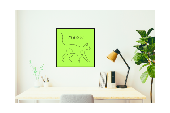 cat lime green photo hanging on wall of office