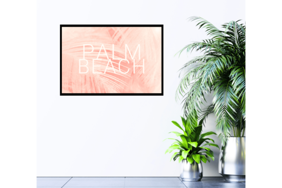 Palm Beach text with peach feather background print hanging on wall