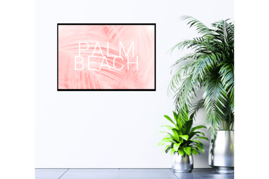 Palm Beach text with light pink feather background print hanging on wall