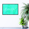 Beautiful text in white with green feather background picture hanging on wall