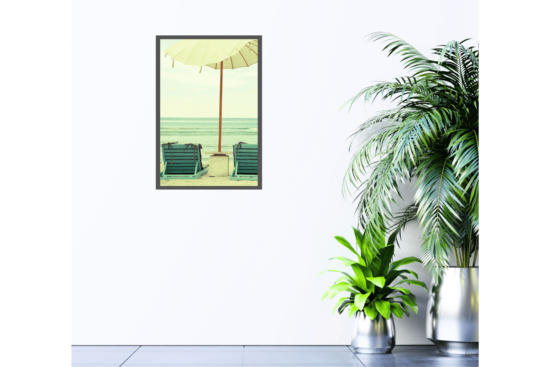 retro green beach chairs with white umbrella on beach picture hanging on wall
