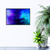 Kindness is Magic quote with abstract blue and purple background picture hanging on wall