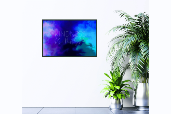 Kindness is Magic quote with abstract blue and purple background picture hanging on wall