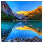 Clear blue lake surrounded by mountains wall print