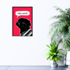 Black pug with red background and speech bubble with "Like, woof." text print on wall